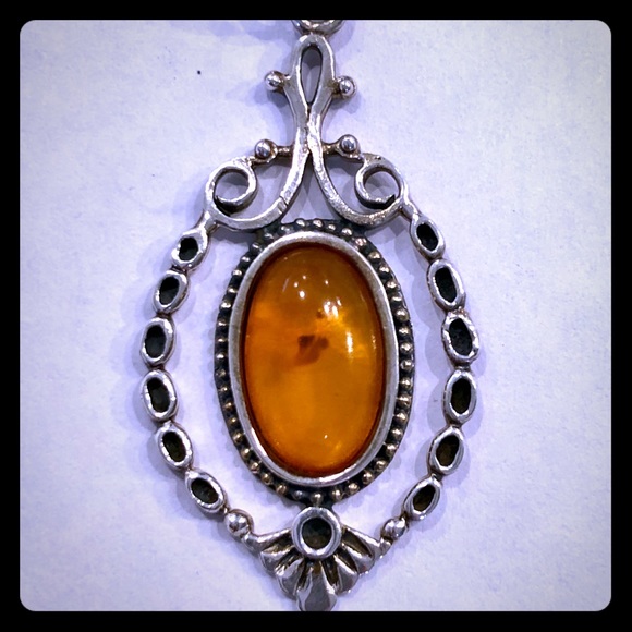 Jewelry - Vintage genuine amber and 925 silver pendant